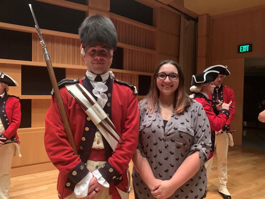 2019-2020 RAP student Elizabeth Rockwell stands with Sergeant William Parks, drum major of the US Army Old Guard.